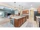 Island kitchen with granite countertops and stainless steel appliances at 6115 Sw 74Th Ct, Ocala, FL 34474