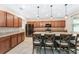 Modern kitchen with an island and seating at 6115 Sw 74Th Ct, Ocala, FL 34474