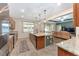 Modern kitchen with island and stainless steel appliances at 6115 Sw 74Th Ct, Ocala, FL 34474