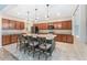 Open kitchen with breakfast bar and pendant lighting at 6115 Sw 74Th Ct, Ocala, FL 34474