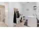 Laundry room features washer, dryer, and storage at 6115 Sw 74Th Ct, Ocala, FL 34474