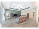 Spacious living room featuring tile floors and a view into the kitchen at 6115 Sw 74Th Ct, Ocala, FL 34474