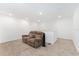 Relaxing loft with reclining sofa and carpet at 6115 Sw 74Th Ct, Ocala, FL 34474