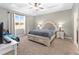 Large main bedroom with carpeted floors and ample natural light at 6115 Sw 74Th Ct, Ocala, FL 34474