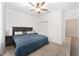 Main bedroom with ceiling fan and large closet at 6115 Sw 74Th Ct, Ocala, FL 34474