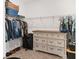 Spacious walk-in closet with ample shelving and drawers at 6115 Sw 74Th Ct, Ocala, FL 34474