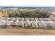 Aerial view of row of houses with street and landscape at 9229 Sw 52Nd Place Rd, Ocala, FL 34481