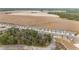 Aerial view of houses near large field and trees at 9229 Sw 52Nd Place Rd, Ocala, FL 34481