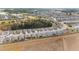 Aerial view of large community with various houses and landscape at 9229 Sw 52Nd Place Rd, Ocala, FL 34481