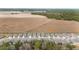 Community overview with multiple one-story houses and open space at 9229 Sw 52Nd Place Rd, Ocala, FL 34481