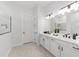 Elegant bathroom boasting double sinks and a frameless shower at 9229 Sw 52Nd Place Rd, Ocala, FL 34481