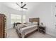 Cozy bedroom with a comfortable bed and built-in desk at 9229 Sw 52Nd Place Rd, Ocala, FL 34481