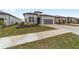 House exterior with landscaping and American flag at 9229 Sw 52Nd Place Rd, Ocala, FL 34481