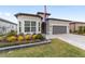 Front of house with landscaping and American flag at 9229 Sw 52Nd Place Rd, Ocala, FL 34481