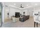 Spacious living room with a large TV and comfortable seating at 9229 Sw 52Nd Place Rd, Ocala, FL 34481