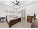 Soothing main bedroom with a sleigh bed and wood dresser at 9229 Sw 52Nd Place Rd, Ocala, FL 34481