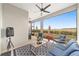 Relaxing screened porch with outdoor furniture and view of open space at 9229 Sw 52Nd Place Rd, Ocala, FL 34481
