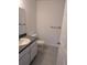 Simple bathroom with toilet and vanity at 963 Sw Temple Heights Ct, Dunnellon, FL 34431