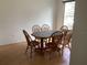 Simple dining room with wood table and chairs at 10814 Sw 83Rd Ave, Ocala, FL 34481