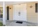 White double front doors with black accents at 1105 Ne 17Th Ne Ter, Ocala, FL 34470