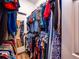 Walk-in closet with ample hanging space and shelving at 14515 Ne 110Th Avenue Rd, Fort Mc Coy, FL 32134