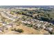 Aerial view of a neighborhood adjacent to a golf course at 16182 Sw 14Th Ave Rd, Ocala, FL 34473