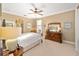 Bright bedroom with large windows and ceiling fan at 16182 Sw 14Th Ave Rd, Ocala, FL 34473