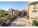 Spacious front patio with pavers, seating area, and nicely landscaped surroundings at 16182 Sw 14Th Ave Rd, Ocala, FL 34473