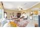 Relaxing living room featuring comfortable furniture and large windows at 16182 Sw 14Th Ave Rd, Ocala, FL 34473