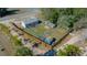 Aerial view showing house and fenced yard at 17175 Ne Jacksonville Rd, Citra, FL 32113