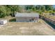 Small house with yard and shed at 17175 Ne Jacksonville Rd, Citra, FL 32113