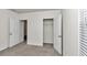 Bedroom with closet and access to another room at 27 Hickory Course Ln, Ocala, FL 34472