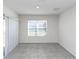 Simple dining area with tile floors and large window at 27 Hickory Course Ln, Ocala, FL 34472