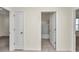 Hallway with access to bathroom and bedroom at 27 Hickory Course Ln, Ocala, FL 34472