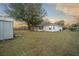 Spacious backyard with shed and screened patio at 37 Willow Run, Ocala, FL 34472