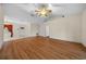 Bright living room featuring hardwood floors and a ceiling fan at 37 Willow Run, Ocala, FL 34472