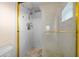 Shower stall with tiled walls and a rainfall shower head at 37 Willow Run, Ocala, FL 34472