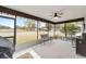 Spacious screened porch overlooks backyard at 5041 County Road 114, Wildwood, FL 34785