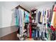 Large walk-in closet with ample hanging space and shelving at 5041 County Road 114, Wildwood, FL 34785