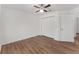 Spacious bedroom featuring wood-look floors and a large closet at 53 Guava Pl, Ocklawaha, FL 32179