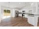 Kitchen with stainless steel appliances and granite counters at 53 Guava Pl, Ocklawaha, FL 32179