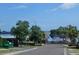 View of street leading to restaurant and lake at 53 Guava Pl, Ocklawaha, FL 32179