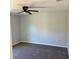 Spacious bedroom with ceiling fan and neutral color walls at 6189 Sw 134Th St, Ocala, FL 34473