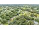 Wide aerial shot showcasing the neighborhood, highlighting the property's location within the community at 66 Teak Loop, Ocala, FL 34472