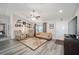 Living room with recliner chairs and decorative wall at 66 Teak Loop, Ocala, FL 34472