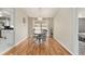 Dining area with hardwood floors and round table at 73 Bahia Trace Crse, Ocala, FL 34472