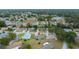 Aerial view showcasing a lovely community with mature trees and well-maintained homes at 8188 Sw 108Th Loop, Ocala, FL 34481