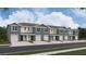 Modern townhome community with attached garages and landscaping at 8380 Gower Trl, Wildwood, FL 34785