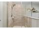 Clean bathroom with a walk-in shower and glass enclosure at 8405 Sw 59Th Ter, Ocala, FL 34476