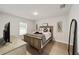 Guest bedroom with a comfortable bed and a neutral color scheme at 8405 Sw 59Th Ter, Ocala, FL 34476